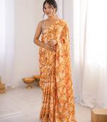 Yellow heavy chinon printed saree with mirror work border