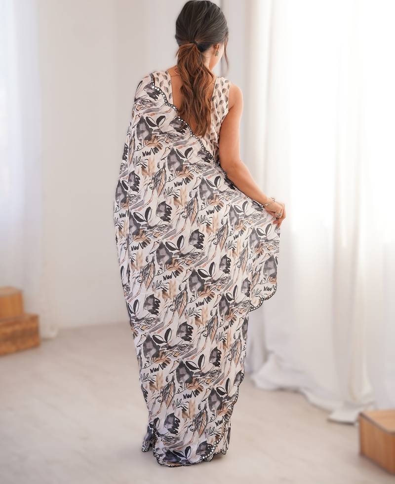 White heavy chinon printed saree with mirror work border