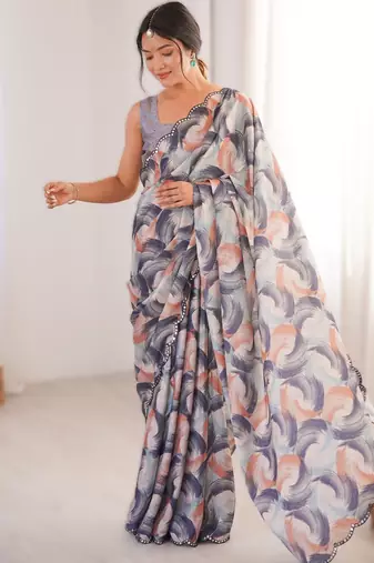 Pruple heavy chinon printed saree with mirror work border