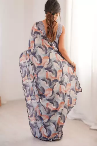 Pruple chinon printed saree with mirror work border