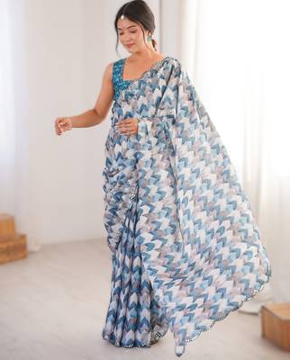 Blue chinon printed saree with mirror work border 1