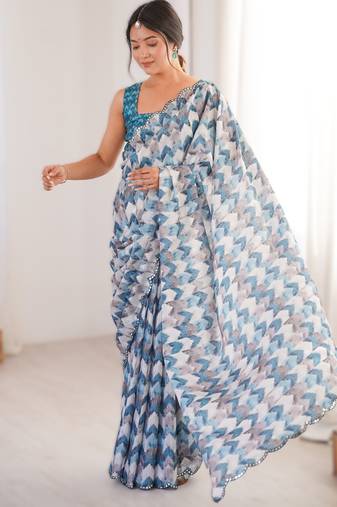 Blue heavy chinon printed saree with mirror work border