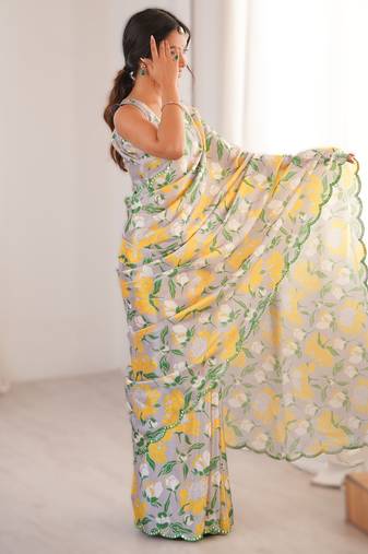 Light grey heavy chinon printed saree with mirror work border