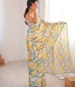 Light grey heavy chinon printed saree with mirror work border