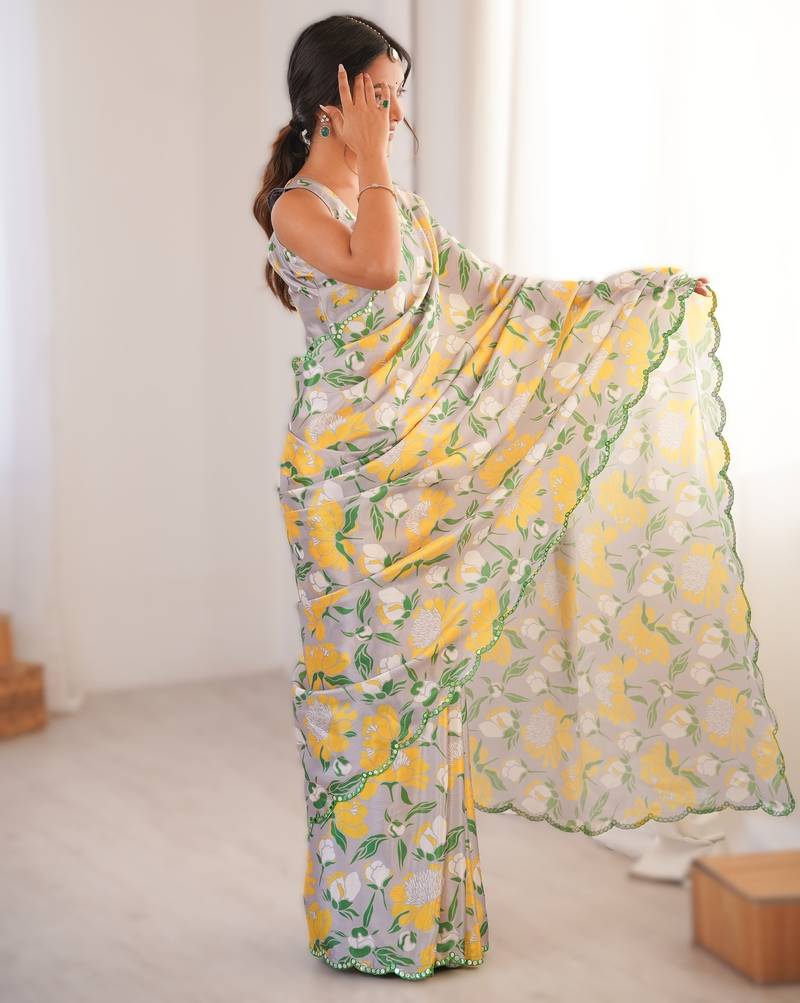 Light grey heavy chinon printed saree with mirror work border