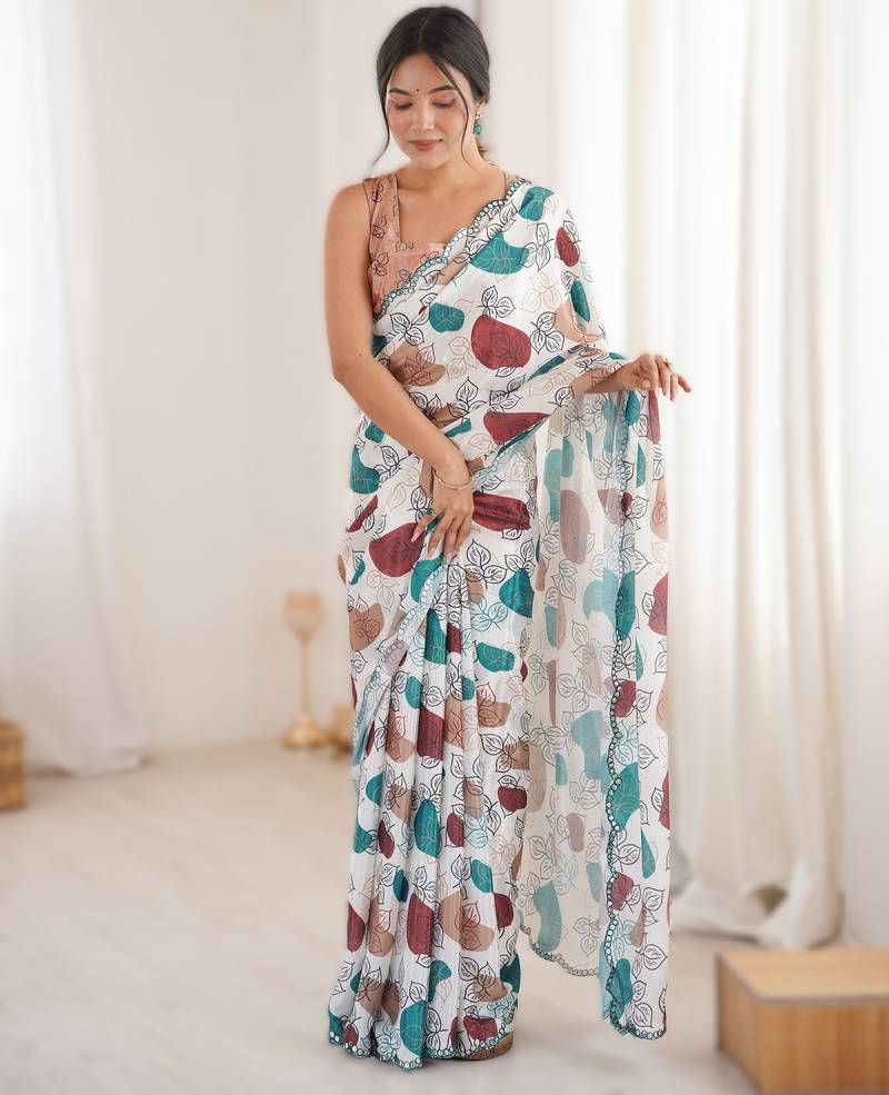 White heavy chinon printed saree with mirror work border