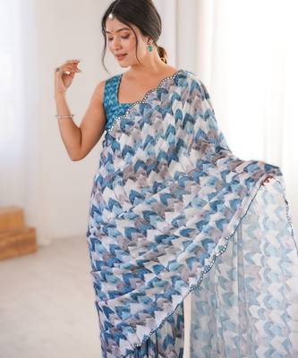 Blue chinon printed saree with mirror work border 3