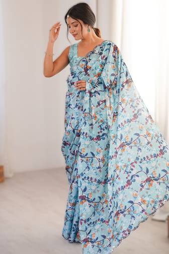Sky blue heavy chinon printed saree with mirror work border