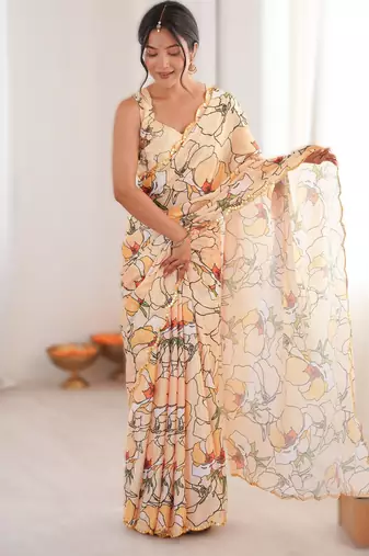 Light yellow heavy chinon printed saree with mirror work border