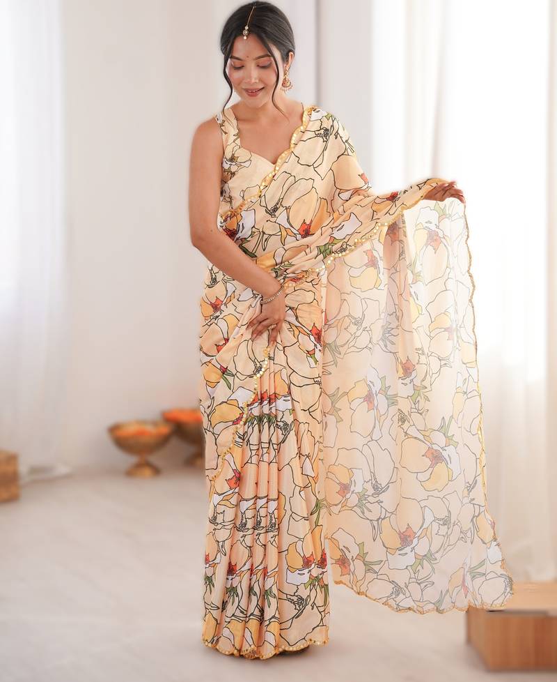 Light yellow heavy chinon printed saree with mirror work border