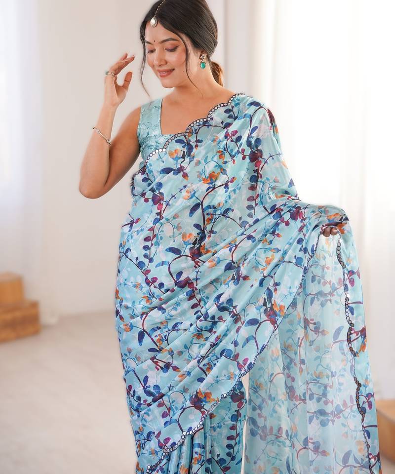 Sky blue heavy chinon printed saree with mirror work border
