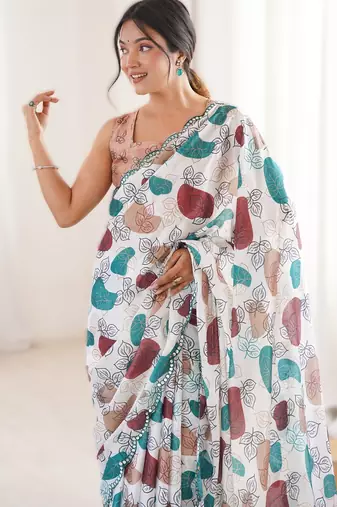 White chinon printed saree with mirror work border