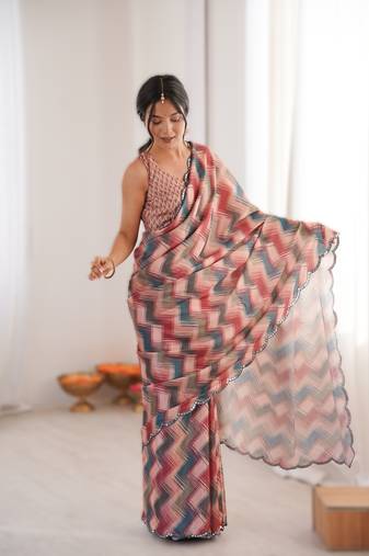 Peach heavy chinon printed saree with mirror work border