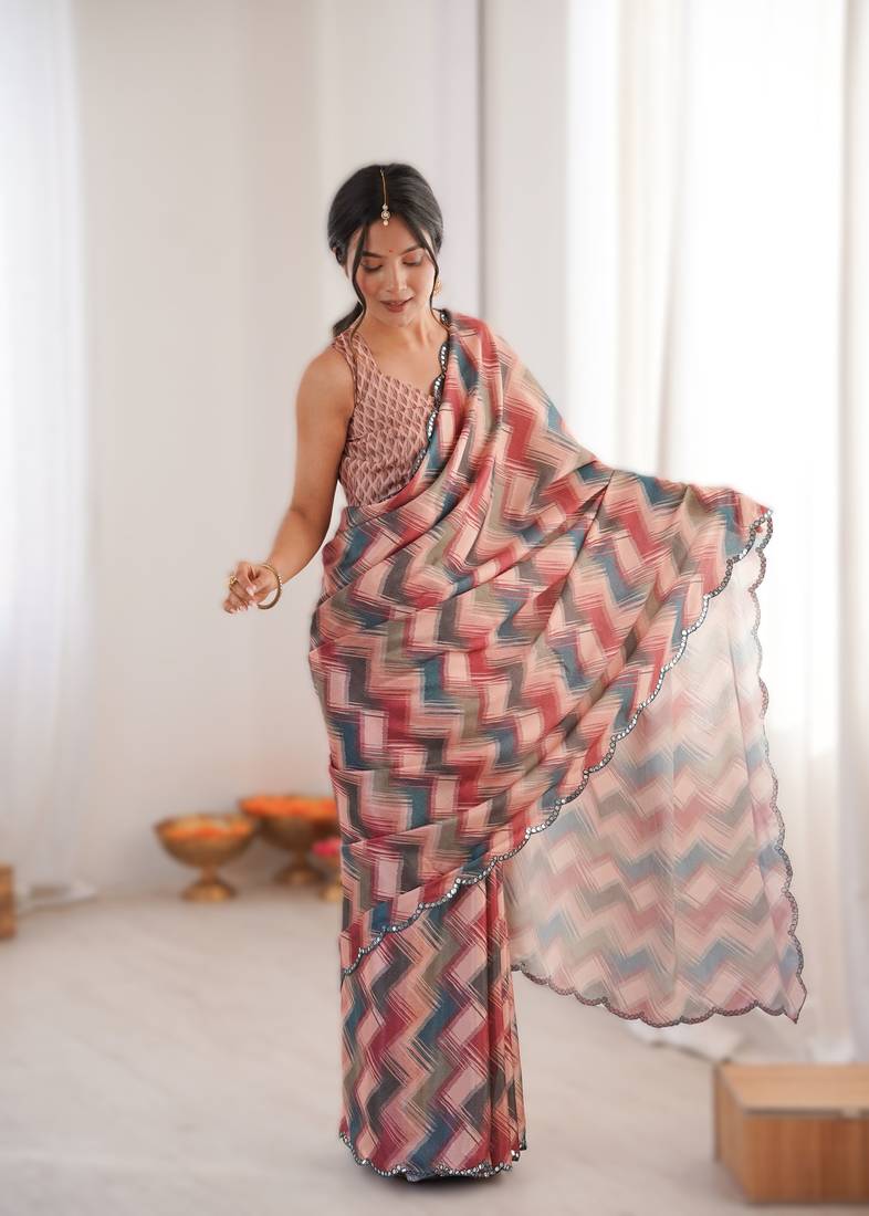 Peach heavy chinon printed saree with mirror work border