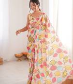 Yellow heavy chinon printed saree with mirror work border