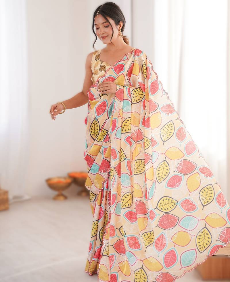 Yellow heavy chinon printed saree with mirror work border