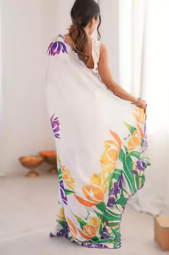 White chinon printed saree with mirror work border