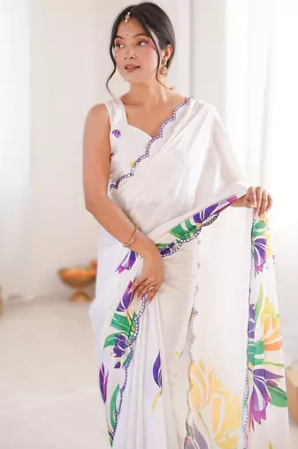 White chinon printed saree with mirror work border