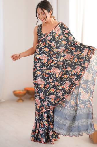 Black heavy chinon printed saree with mirror work border