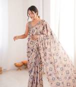 Chikoo heavy chinon printed saree with mirror work border