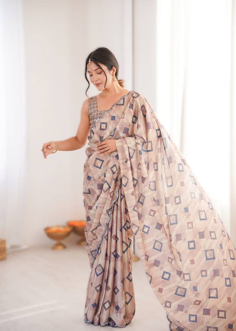 Chikoo heavy chinon printed saree with mirror work border