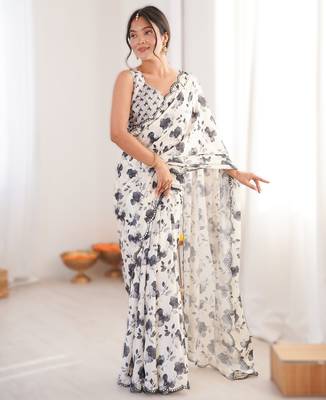 White chinon printed saree with mirror work border 1