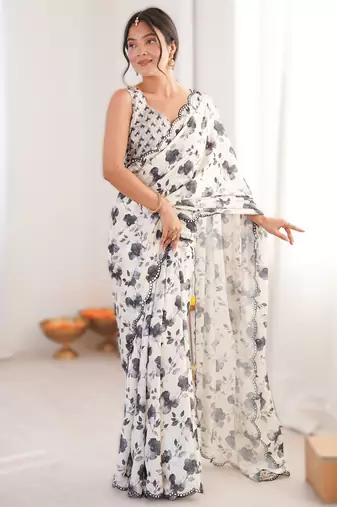 White heavy chinon printed saree with mirror work border