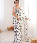 White heavy chinon printed saree with mirror work border