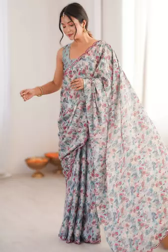 Blue heavy chinon printed saree with mirror work border