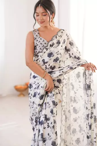 White chinon printed saree with mirror work border