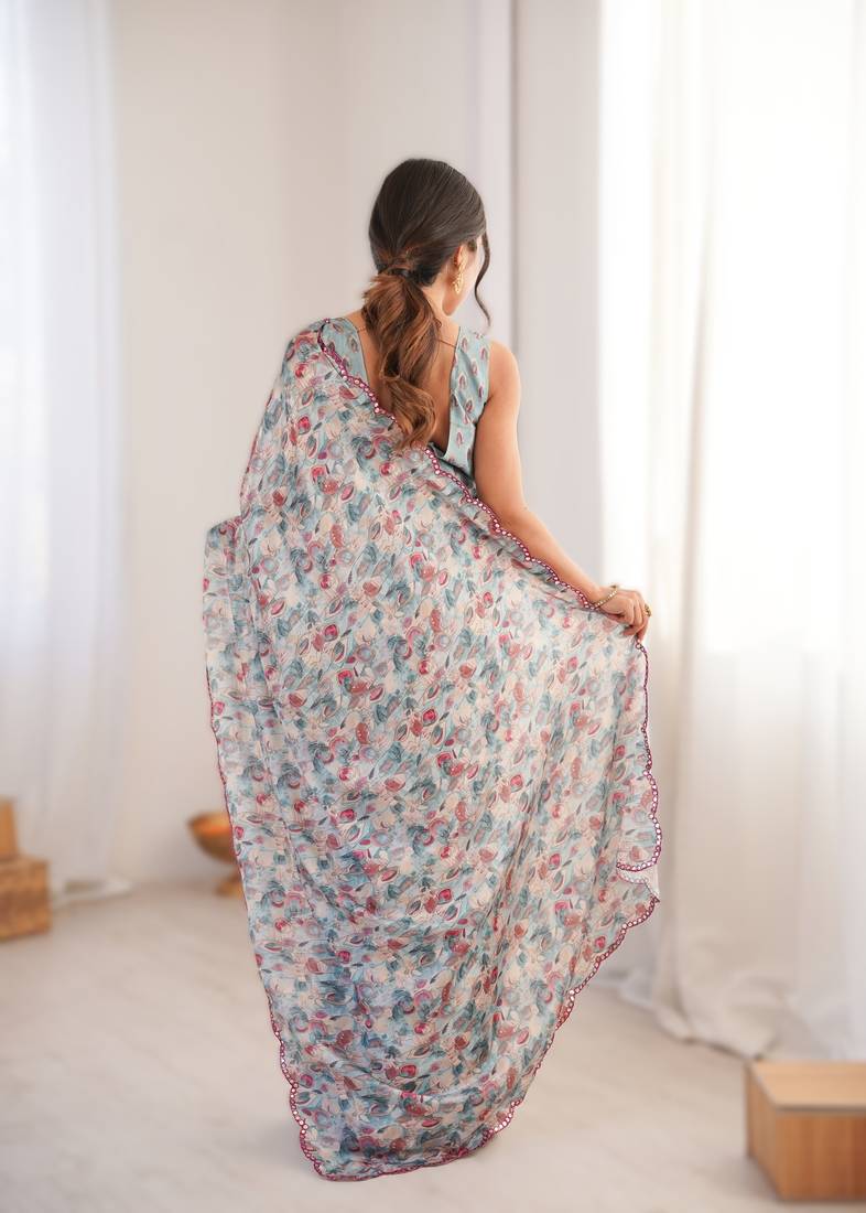 Blue heavy chinon printed saree with mirror work border