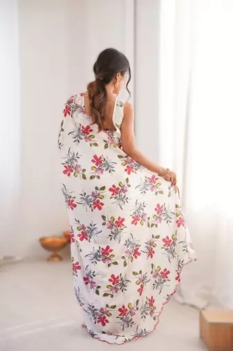 White chinon printed saree with mirror work border