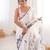 White heavy chinon printed saree with mirror work border