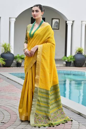 yellow soft khadi raw art silk saree with patola pallu