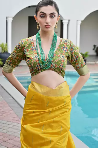 yellow soft khadi raw art silk blend saree with patola pallu
