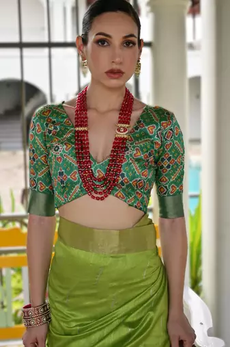 green soft khadi raw art silk blend saree with patola pallu