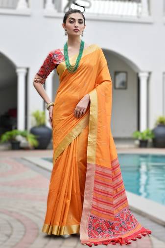 orange soft khadi raw art silk saree with patola pallu