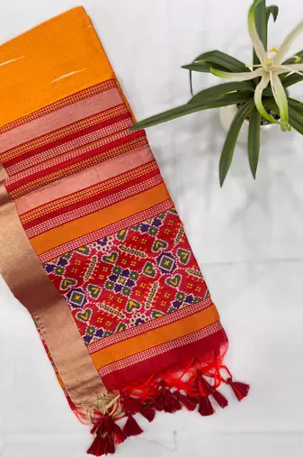 orange soft khadi raw art silk blend saree with patola pallu