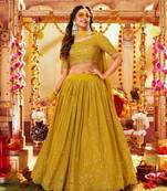 Yellow georgette semi stitched lehenga choli with sequence & thread work