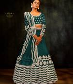 teal-blue net lehenga set with choli and dupatta 