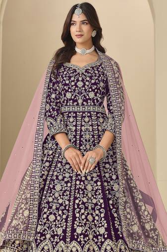 Purple velvet anarkali suit with net dupatta