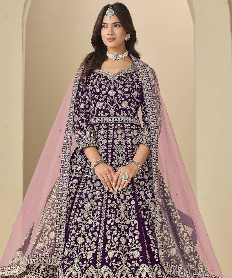 Purple velvet anarkali suit with net dupatta