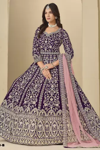 Purple velvet anarkali suit with net dupatta