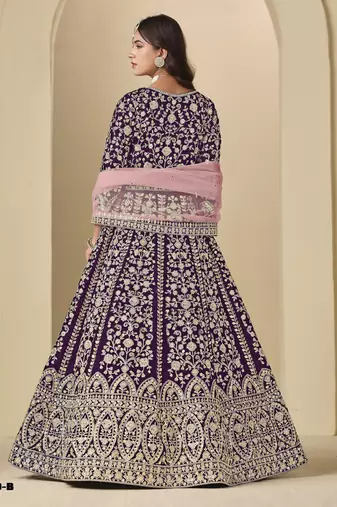 Purple velvet anarkali suit with net dupatta