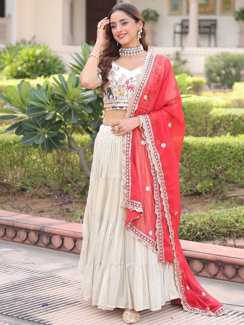 Sparkling Off-White Embroidered Silk Wedding Wear Lehenga Choli