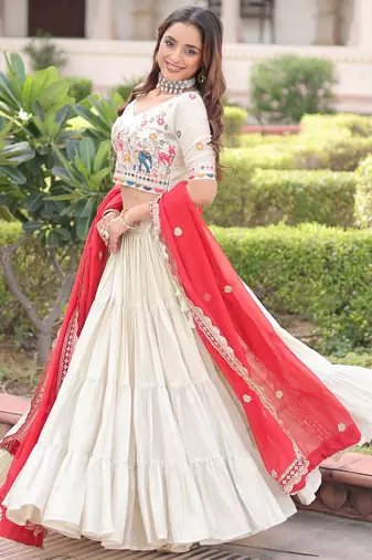 Sparkling Off-White Embroidered Silk Wedding Wear Lehenga Choli