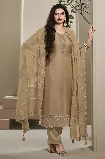 Beige silk embroidered salwar suit.
