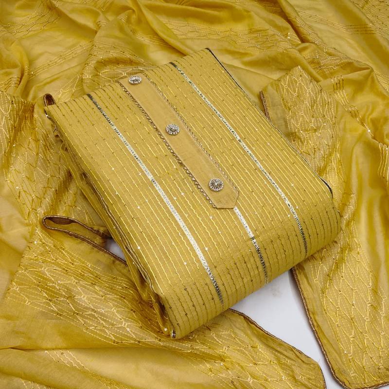 yellow cotton woven dress material