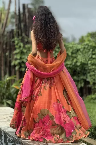 orange printed organza lehenga set