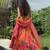 orange printed organza lehenga set